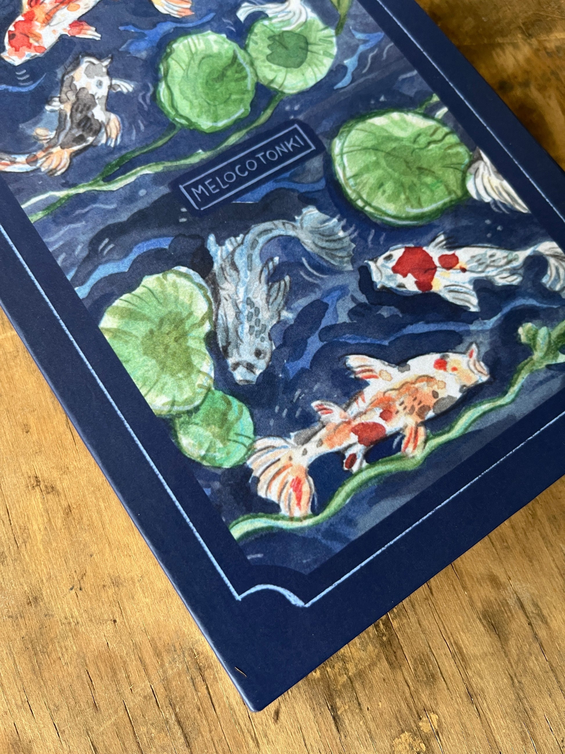 Detail of an illustrated backcover of a hard cover notebook