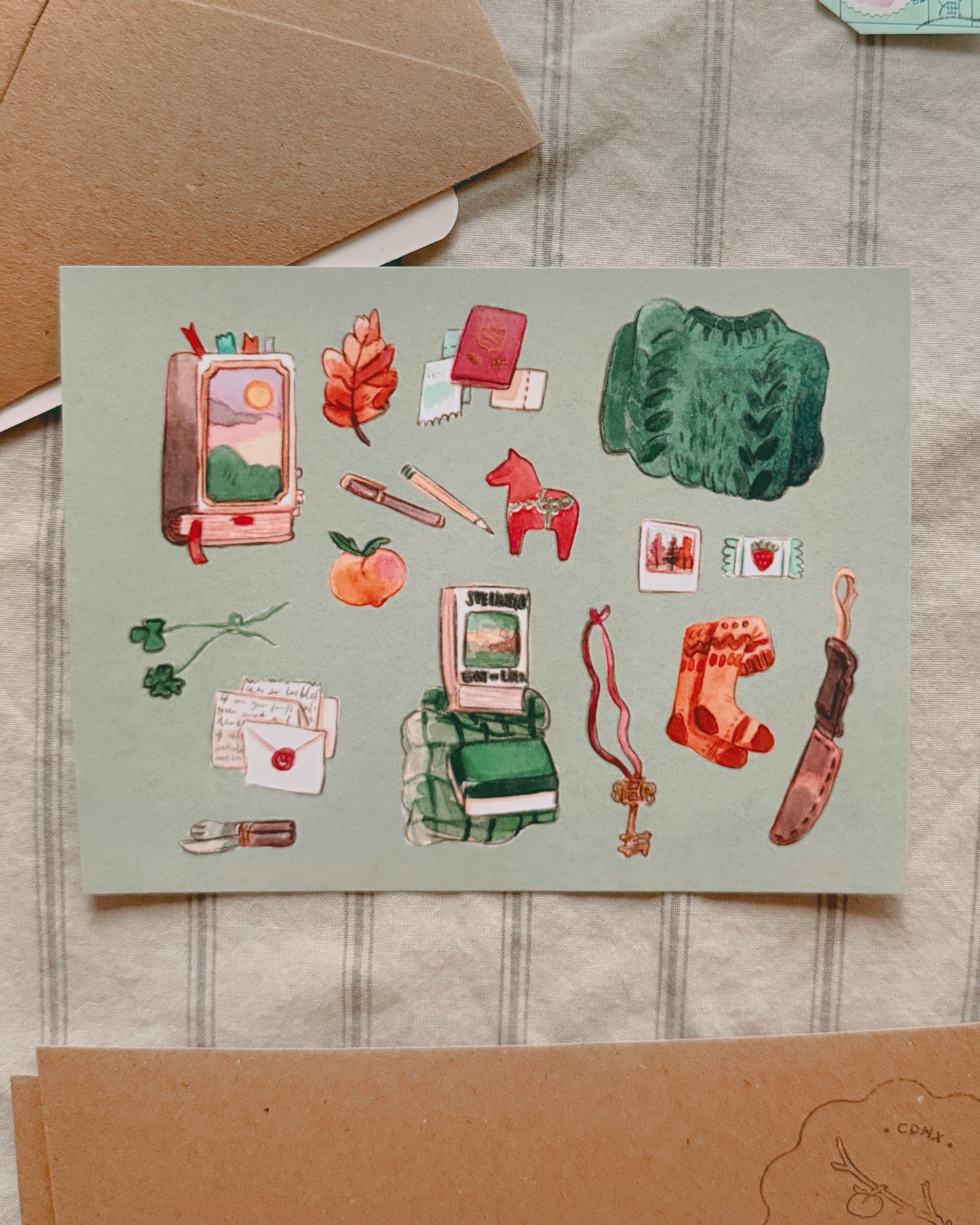 Postal de viaje Zooey 🧦📕🍀🎟️