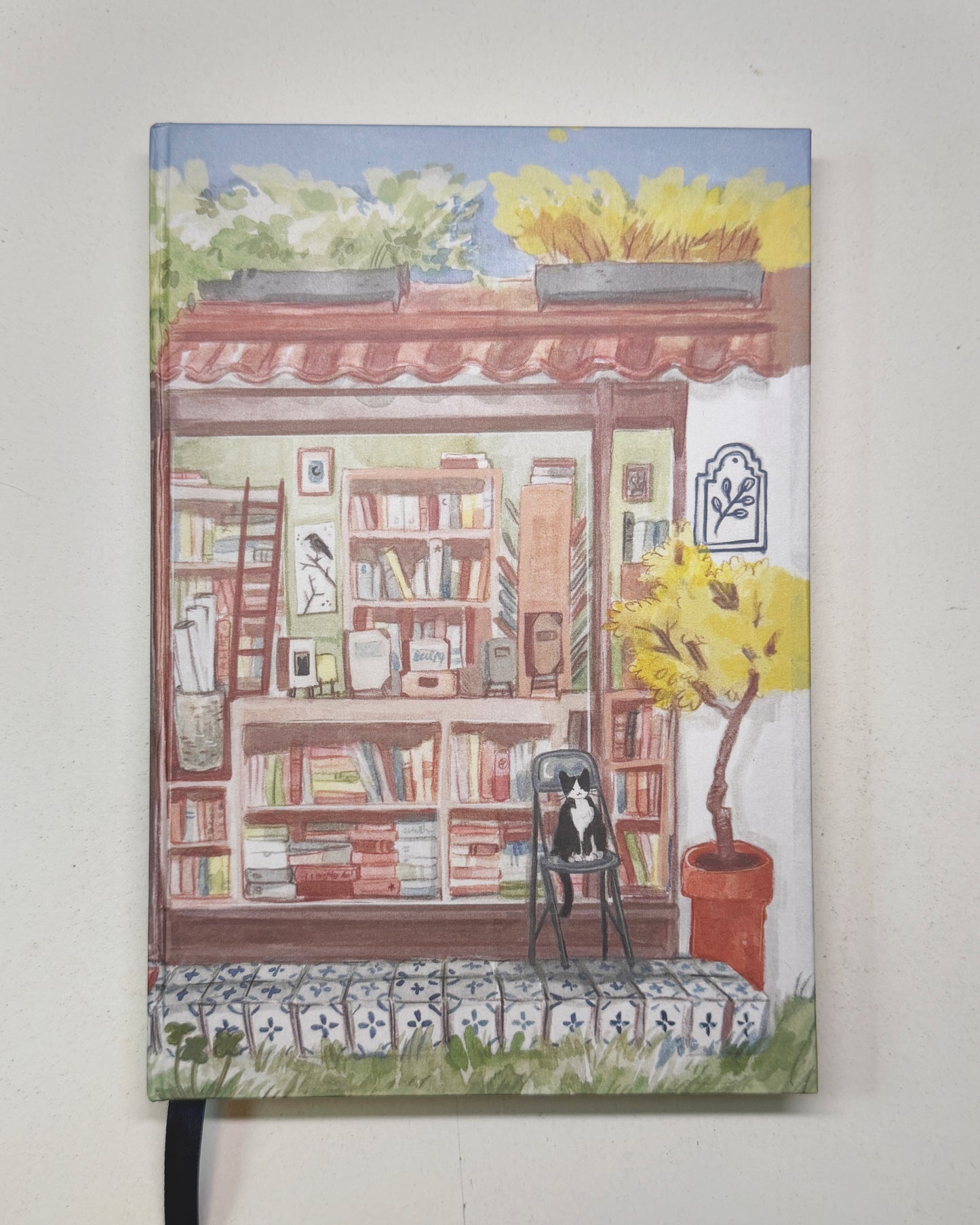 Libreta Librería en el Jardín  1/2 carta , pasta dura, cuaderno, sketchbook, bullet journal